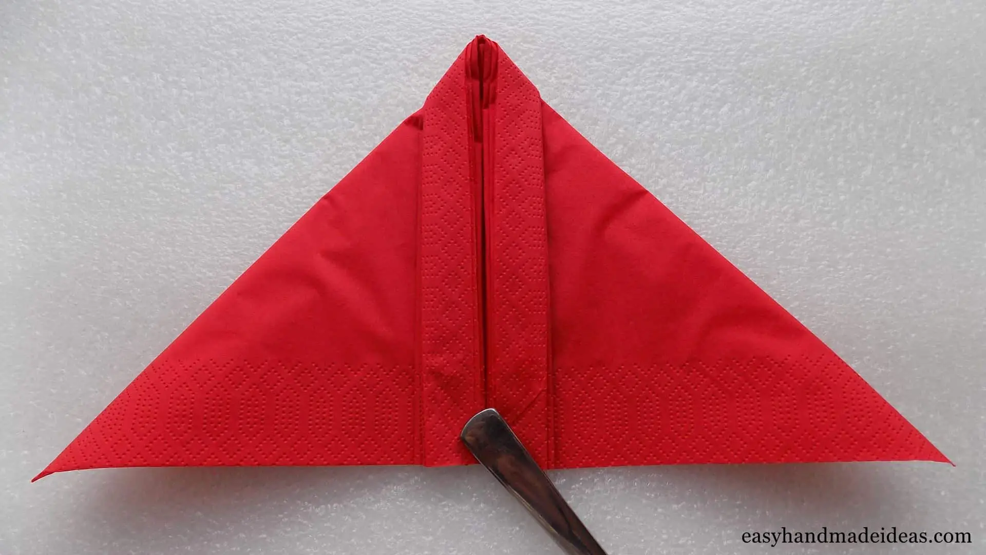 Folded rectangle into a triangle