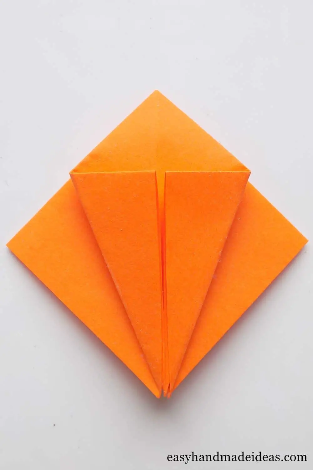 Square with the corners folded inwards